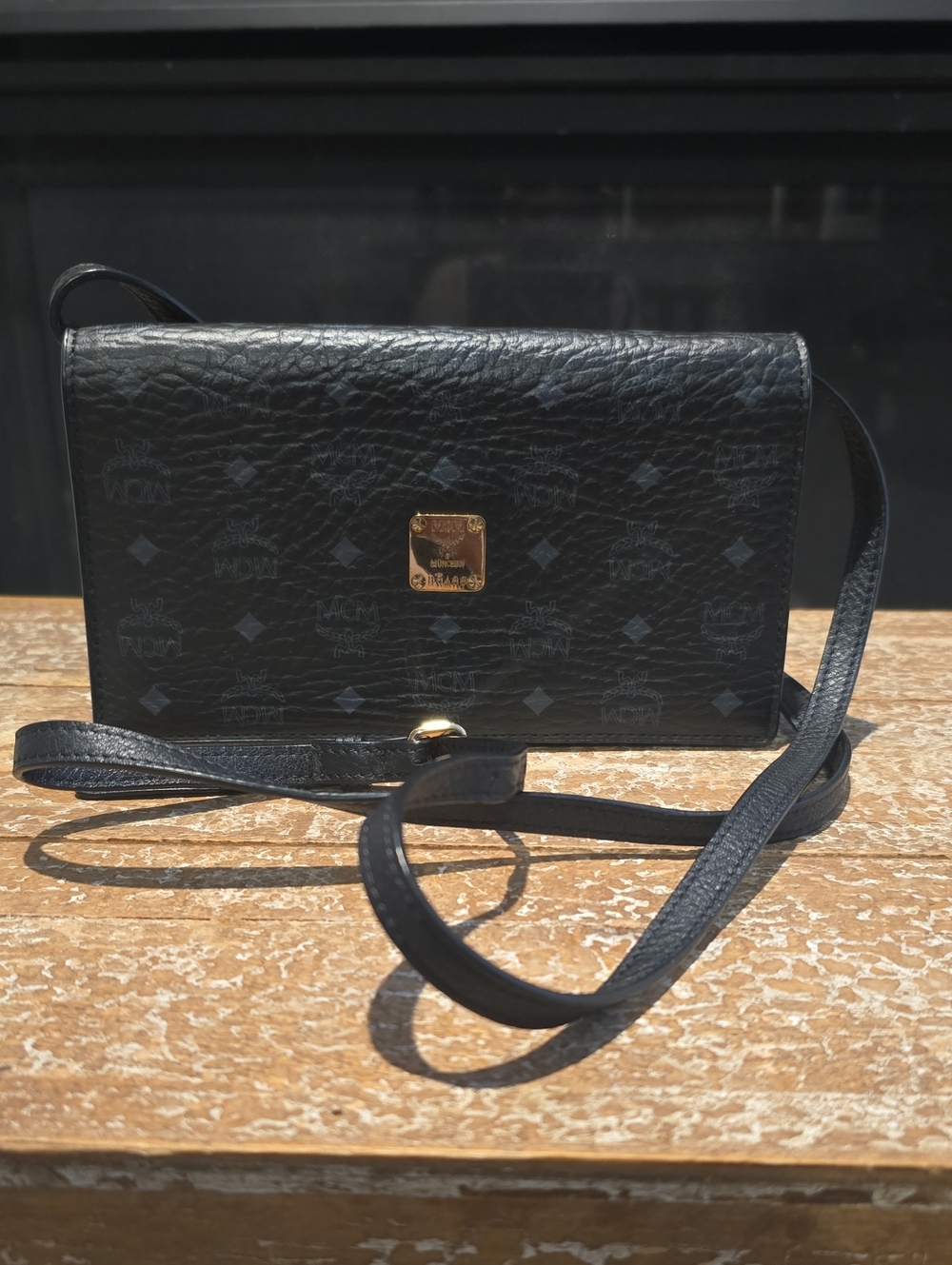 MCM Black Leather Crossbody Wallet with Gold Plaque